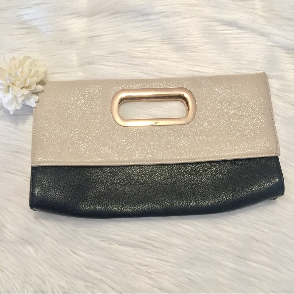 Express beige and black clutch. New!